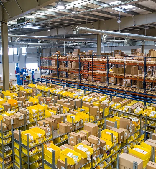 Warehouse aisles stacked with boxes