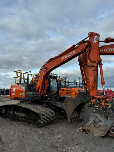 Tracked excavator on a UK construction site